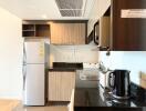 Modern kitchen with built-in appliances and storage