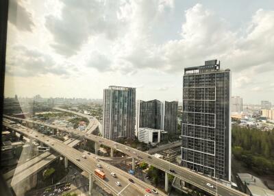 View of modern high-rise buildings and highway.