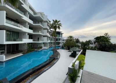 Modern apartment complex with swimming pool