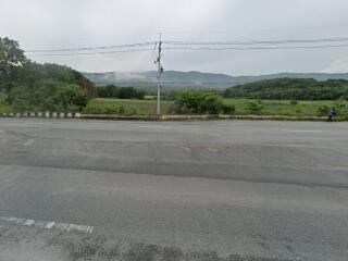 Scenic view of a road with mountains in the background