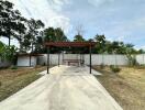 Spacious outdoor area with covered sitting space