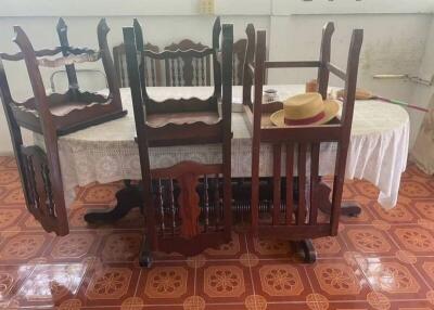 Dining room with table and chairs stacked