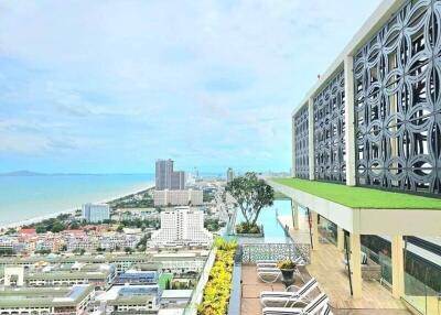 Scenic rooftop with ocean and city view