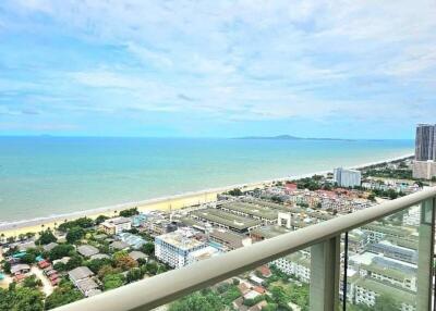 Scenic view from the balcony overlooking the ocean and city