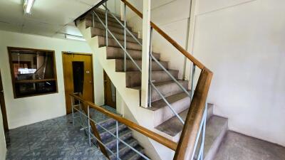 Interior staircase with handrails