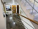 Interior view of a building corridor with stairs