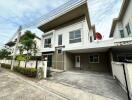 Two-story house with garage and front yard