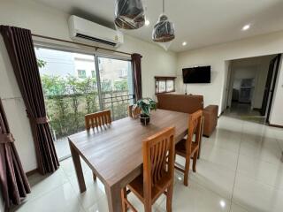 Modern living room with dining area