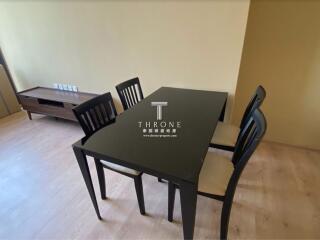 Modern dining area with a table and chairs