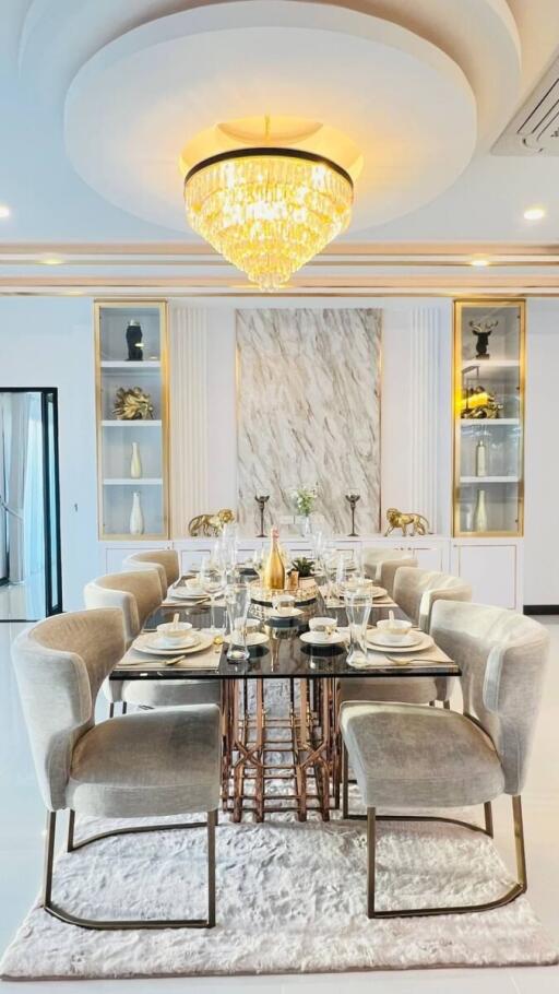Elegant dining room with luxurious chandelier and modern decor
