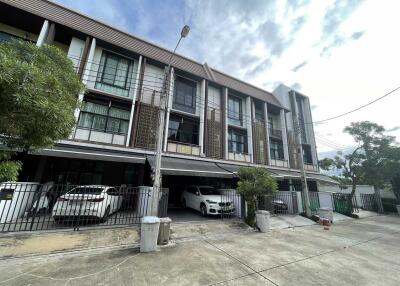 Front exterior of a multi-story residential building