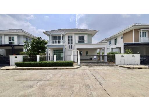 Two-story house with a front yard