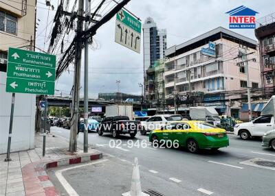 Street view with traffic and signage