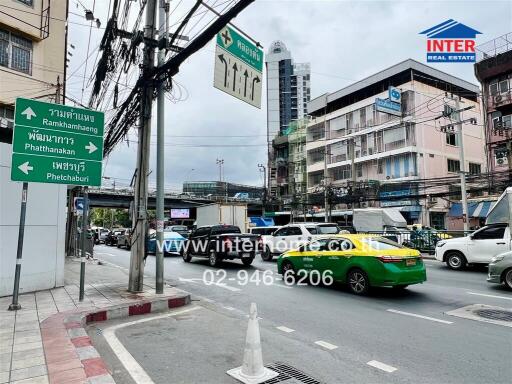 Street view with traffic and signage