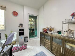 Modern kitchen with appliances and pantry