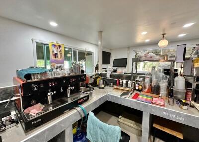 Modern kitchen with coffee maker and various appliances