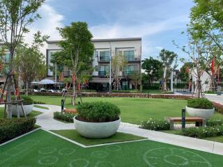 Modern residential building with a garden space