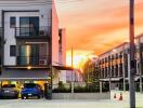 Modern townhouse complex at sunset