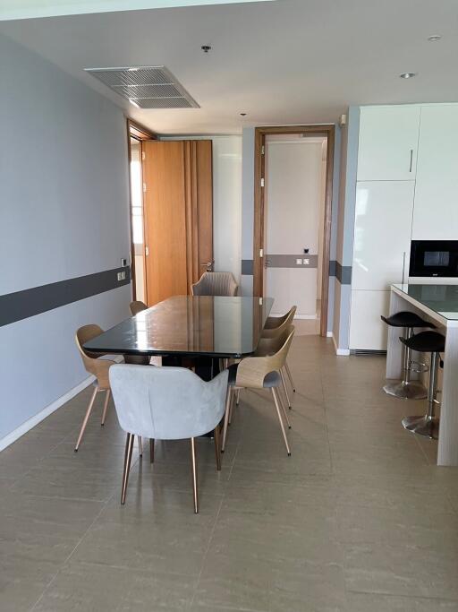 Modern dining area with a table and chairs