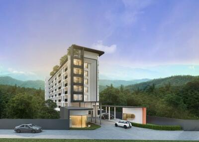 Exterior view of a modern multi-story residential building with cars parked in front, set against a mountainous backdrop.