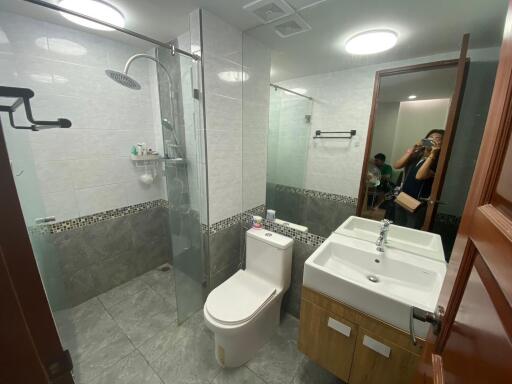 Modern bathroom with glass shower and vanity