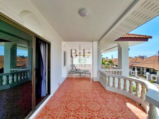 Spacious Balcony with Tile Flooring and Outdoor Seating