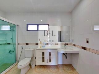 Modern bathroom with shower and vanity