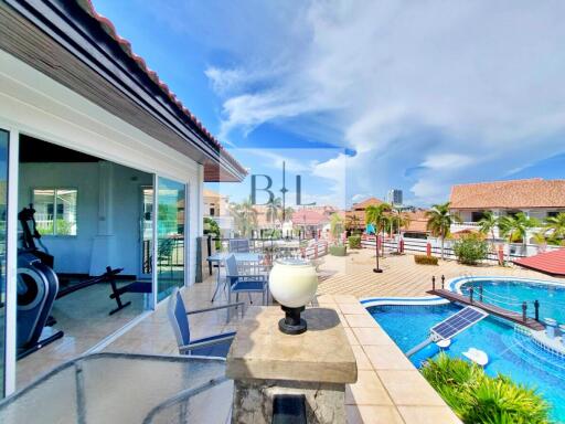 Outdoor patio with pool view