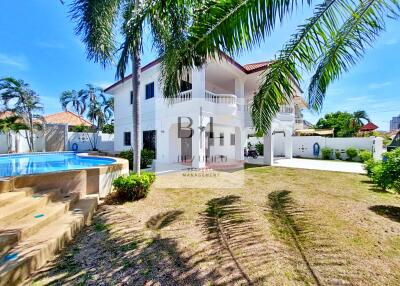 Spacious two-story house with pool and garden