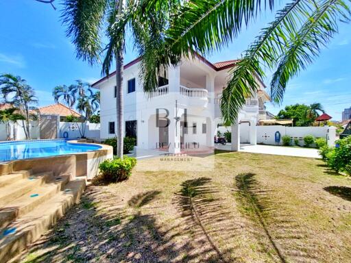 Spacious two-story house with pool and garden