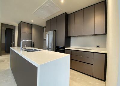 Modern kitchen with island and stainless steel appliances