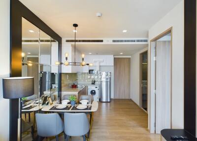 Modern open-plan dining area and kitchen with contemporary decor