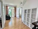 Bright hallway with wooden flooring