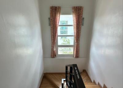 Bright staircase with a window