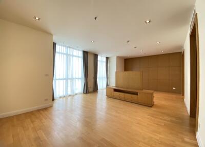 Spacious living room with large windows