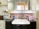 Modern bathroom sink with mirror and storage shelves