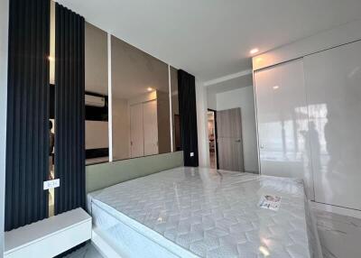 Modern bedroom with bed and closet