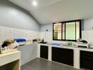 Modern kitchen with appliances and tiled backsplash