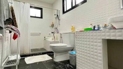 Modern bathroom with white tiles