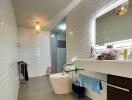 Modern bathroom with tiled walls and vanity