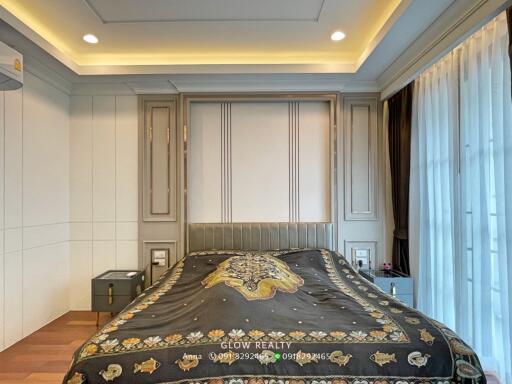 luxurious bedroom with bed and decorative elements