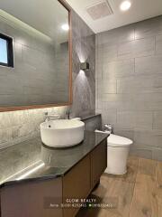 Modern bathroom with vanity and toilet