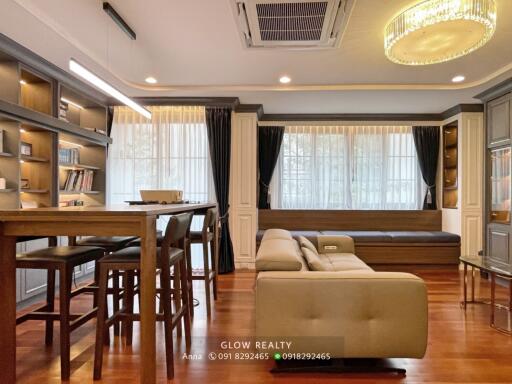 Elegant and modern living room with natural light and stylish furniture