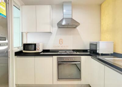 Modern white kitchen with appliances