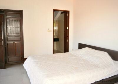 Spacious bedroom with adjoining bathroom