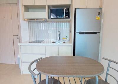 Compact kitchen with dining table