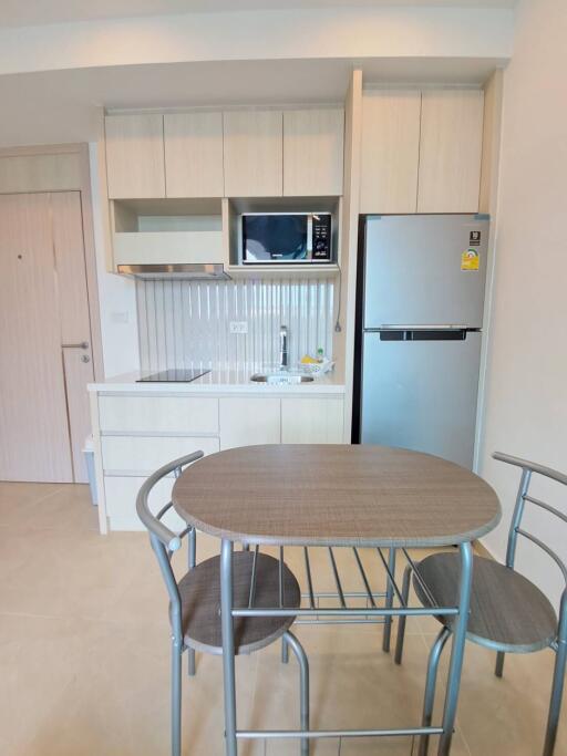 Compact kitchen with dining table