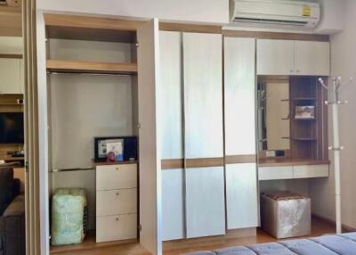 Spacious bedroom with built-in wardrobe and air conditioning