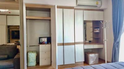 Spacious bedroom with built-in wardrobe and air conditioning