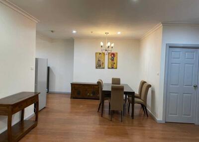 Dining room with table, chairs, and decorative items